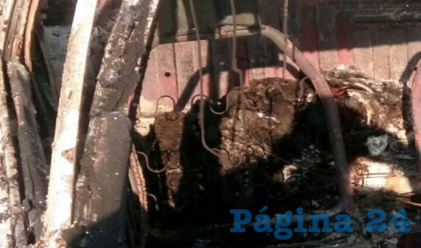 En los asientos traseros de un automóvil Chevrolet Chevy se encontró el cuerpo