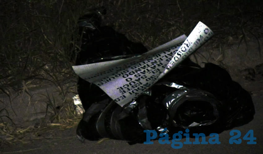 As&iacute; encontraron las autoridades el cad&aacute;ver, envuelto en varias bolsas y con un narcomensaje