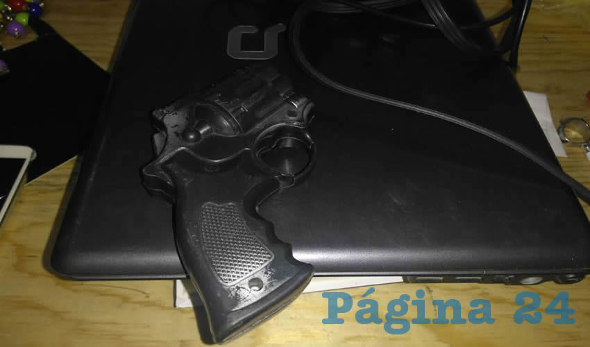 La pistola que utilizaban los tres rateros