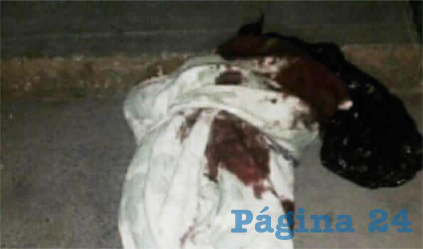 Uno de los cuerpos decapitado y el arribo de la Policía a la calle Río Yaqui