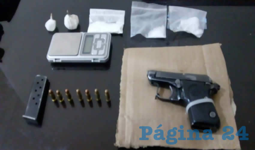 La pistola, los cartuchos y la droga