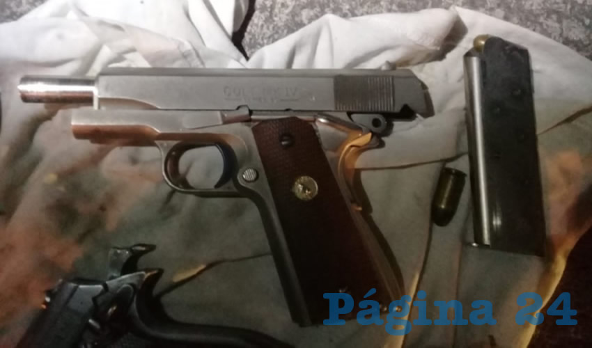 La pistola que portaba el uniformado &Eacute;dgar Andr&eacute;s Fern&aacute;ndez Rojas
