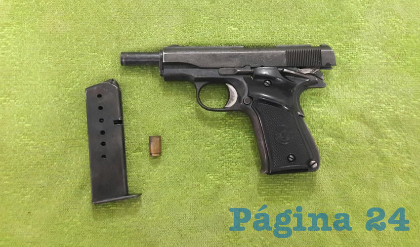 LA pistola calibre .380, con un cargador