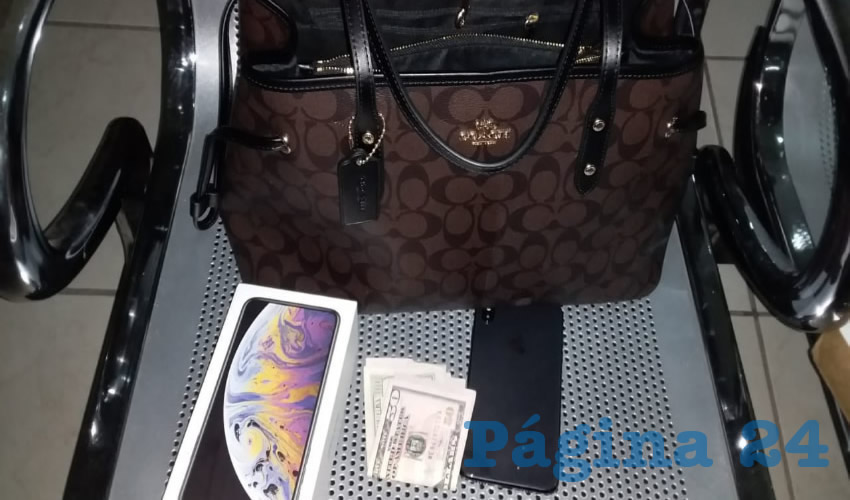 El bot&iacute;n del delincuente, una bolsa con 250 d&oacute;lares y dos tel&eacute;fonos celulares