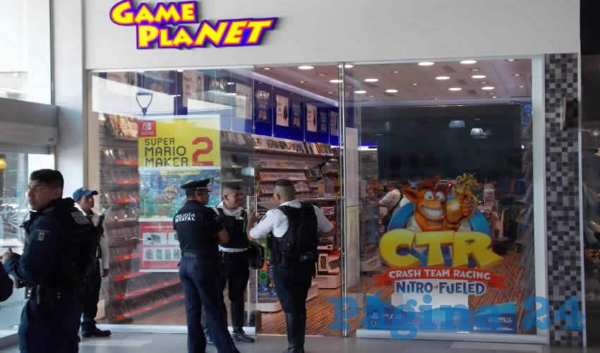 La tienda Game PLanet, del centro comercial Espacio, fue “visitada” por dos maleantes