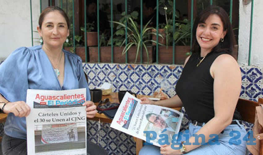 Grupo de personas desayunando.